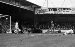 Peter Anderson’s shot heads for goal watched by Ron Futcher
