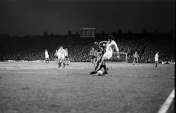 John Aston fights for the ball