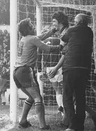 Goalscorer Adrian Alston is congratulated by Jimmy Husband