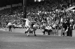 Adrian Alston challenges by the tunnel