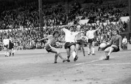 Peter Anderson gets an effort away