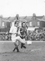 Jimmy Husband in a determined challenge for the ball