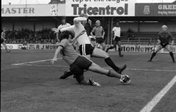 Peter Anderson cannot get the better of Bobby Moore