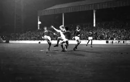 Ron Futcher battles with the keeper