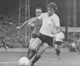 John Aston chases down City's Gary Collier
