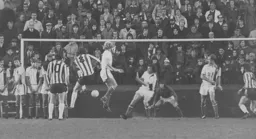 Saints Mick Channon fires the ball in