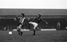 Brian Chambers slips past a defender