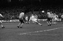 Ron Futcher with a flying header