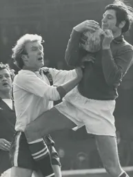 Ron Futcher challenges Orient goalkeeper John Jackson