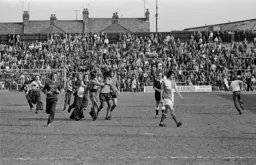 Ricky Hill mobbed after the game