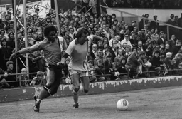 Ricky Hill held up by Forest’s Frank Clark