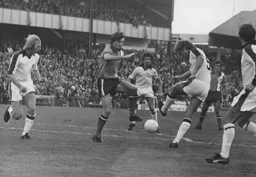 Jimmy Ryan is surrounded by Argyle defenders