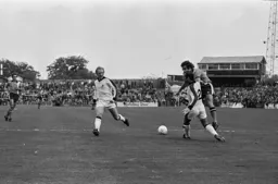 Jimmy Husband shoots through a couple of defenders