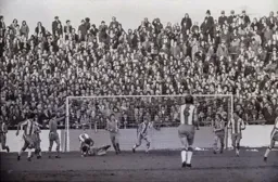 Milija Aleksic gathers the ball in front of the packed terrace