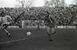 John Aston in a chase for the ball