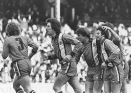 Jimmy Husband is congratulated on his goal