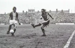 John Aston crosses