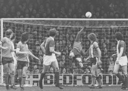 Milija Aleksic tips the ball over the top