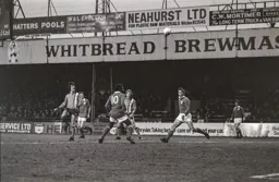 Brian Chambers heads towards the Millwall goal