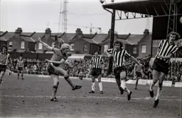 Ron Futcher tries a shoot from the edge of the box
