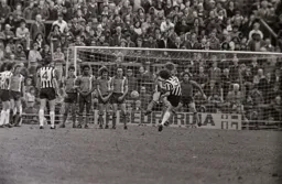 Town wall tries to stand firm