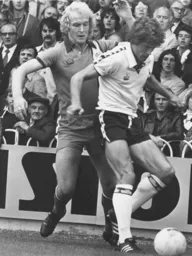 Ron Futcher attempts to win the ball