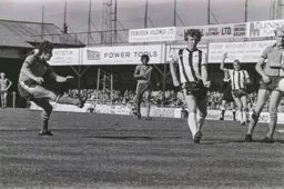 Jimmy Husband fires a shot towards goal