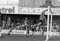 Fulham keeper palms the Town effort over the bar