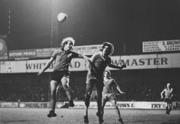 Ron Futcher goes up for a cross