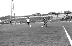 Ron Futcher races past Sam Allardyce