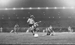 Alan West ushers the ball back