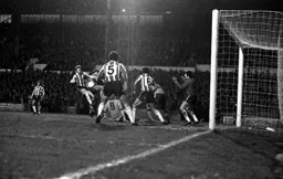 Ron Futcher as usual in the thick of things in the box