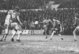 Ricky Hill lays the ball off