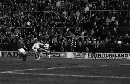 Ron Futcher fires a shot at goal in the drab 0-0 draw