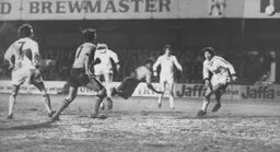 Ricky Hill tries a diving header