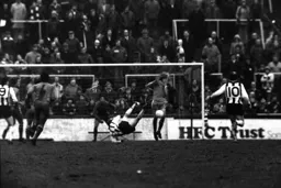 Paul Futcher gets in the way of a spectacular kick