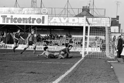 Phil Boersma watches his effort just creep inside the post
