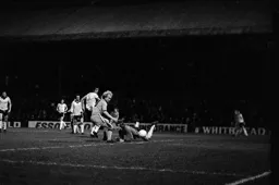 Ron Futcher about to lose his footing with an open goal in front of him