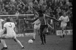 Ricky Hill glides past the Blackpool midfield
