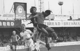 Brian Stein blocks the Blackpool goalkeeper