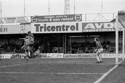 Brian Stein gets his head to the ball