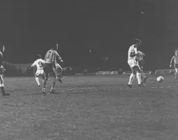 Bolton's Sam Allardyce passes back to his goalkeeper