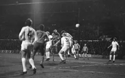 John Faulkner first to the ball