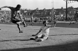 Brian Stein fires in a cross