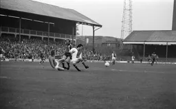 Bob Hatton just second to the ball