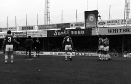 Ricky Hill over the free kick