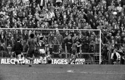 Mal Donaghy makes sure the ball is cleared