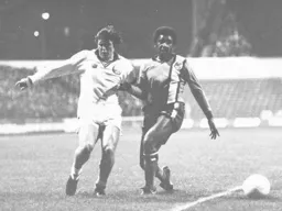 Ricky Hill tangles with Leeds' Eddie Gray