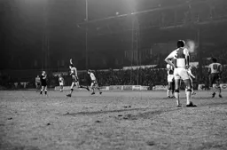 David Moss arm in the air celebrating goal one