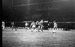 Bob Hatton tangles with the Stoke defence